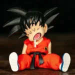 Dragon Ball inspired Sleeping Kid Goku 10cm anime figure in sitting pose with cute expression